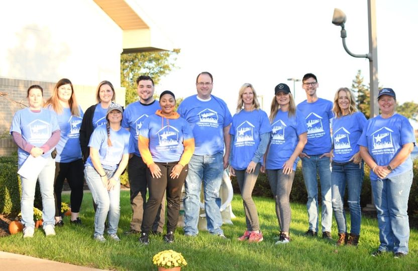 Local REALTORS® Paint City Fire Hydrants to Support NeighborLink’s Furnace Program